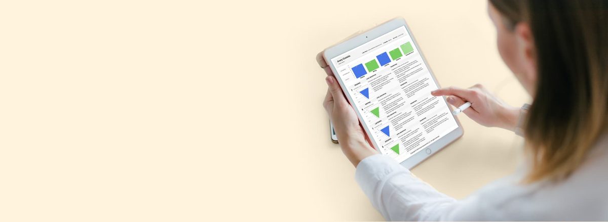 person viewing a report on their tablet.