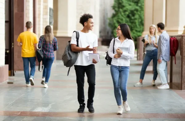 College Student talking as the walk to class.